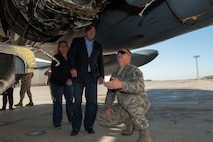 Senators Heidi Heitkamp and Joe Donnelly look into the engine of a B-52H Stratofortress at Minot Air Force Base, N.D., Sep. 27, 2015. (U.S. Air Force photo/Airman 1st Class Christian Sullivan)