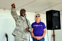 Col. Rodney Lewis, 319th Air Base Wing commander, offers welcoming remarks at the 2015 UND Military Appreciation Day event Sept. 26 in Grand Forks, North Dakota. Guests were treated to a tailgate party ahead of the matchup between the University of North Dakota and the University of California, Davis. (U.S. Air Force photo/Staff Sgt. Susan L. Davis)