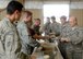 Shaw leadership and local volunteers serve Airmen during the 7th Annual Military Appreciation Picnic at Shaw Air Force Base, S.C., Sept. 25, 2015. Leadership from various squadrons came out to show their support for Team Shaw. (U.S. Air Force photo by Airman 1st Class Christopher Maldonado/Released)