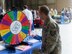 A U.S. Air Force Airman spins a prize wheel during the 7th Annual Military Appreciation Picnic at Shaw Air Force Base, S.C., Sept. 25, 2015. During the picnic Airmen received goodies and information about the businesses in the local area. (U.S. Air Force photo by Airman 1st Class Christopher Maldonado/Released)