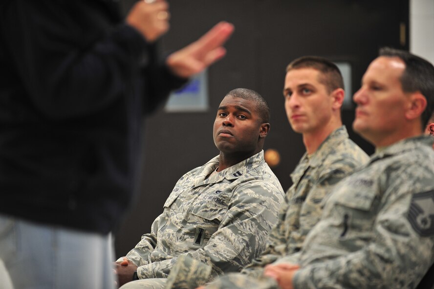 Airmen from the 91st Missile Wing listen to a speech by LeAnn Hull at Minot Air Force Base, N.D., Sept. 23, 2015. Hull shared the story of her son Andy who was lost to suicide when he was only 16 years old and offered advice on recognizing the signs of suicide in others. (U.S. Air Force photo/Senior Airman Stephanie Morris)