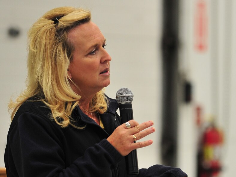 LeAnn Hull speaks to Airmen from the 91st Missile Wing at Minot Air Force Base, N.D., Sept. 23, 2015. Hull shared the story of her son Andy who was lost to suicide when he was only 16 years old and offered advice on recognizing the signs of suicide in others. (U.S. Air Force photo/Senior Airman Stephanie Morris)