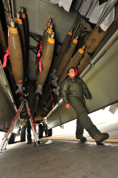 Members of the 69th Bomb Squadron inspect munitions before a bombing mission at Minot Air Force Base, N.D., Sept. 23, 2015. The mission involved the dropping of ordnance on predetermined practice targets. The 69th BS is tasked with both conventional and nuclear mission sets, and maintains the capability to perform both mission sets simultaneously. (U.S. Air Force photo/Senior Airman Stephanie Morris)