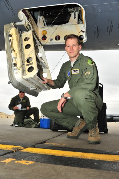 Capt. Cory Halvorson, 69th Bomb Squadron pilot, prepares to leave for a bombing mission at Minot Air Force Base, N.D., Sept. 23, 2015. The mission involved the dropping of ordinance on predetermined practice targets. One pass included six weapons on four different targets; another pass included four weapons on four different targets. (U.S. Air Force photo/Senior Airman Stephanie Morris)