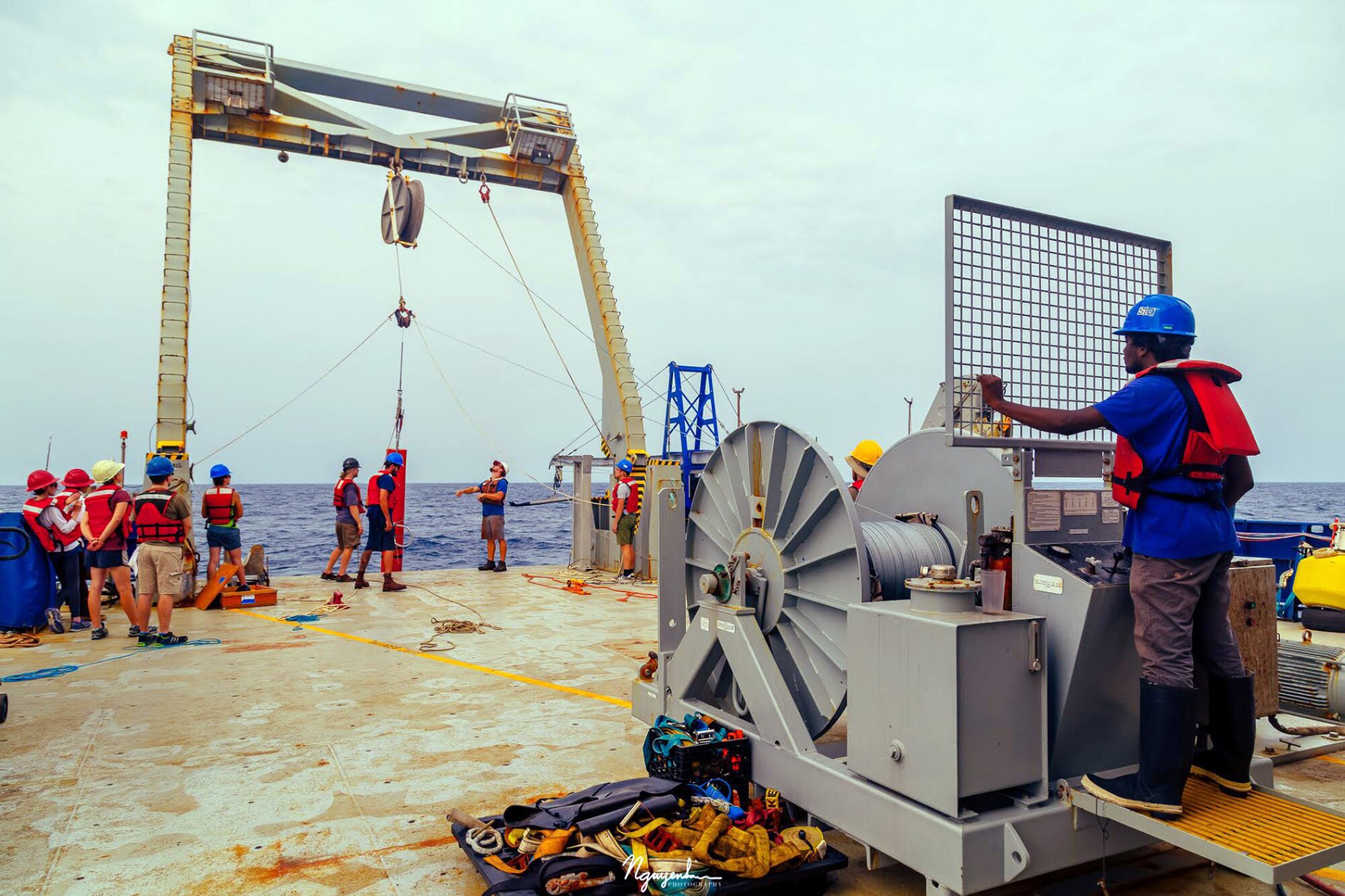 U.S. and Indian scientists aboard the research vessel R/V Roger Revelle deploy a drifting spar buoy to measure upper ocean density and velocity in the Bay of Bengal. The month-long, ONR-sponsored mission centered on monsoon prediction. (Photo courtesy of the R/V Roger Revelle)