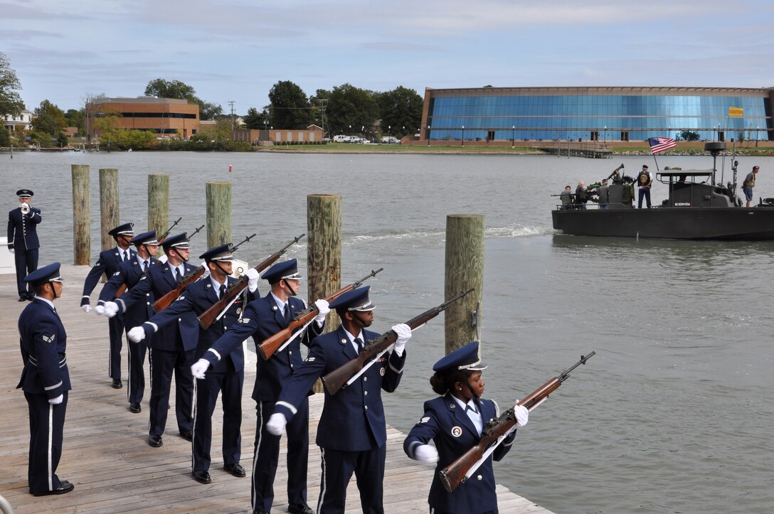 Members of the Langley Air Force Base Honor Guard perform a 21-gun salute during the 458th Sea Tigers 2015 Reunion Memorial ceremony at the Hampton Maritime Center in Hampton, Va., Sept. 24, 2015. U.S. Service members from Joint Base Langley-Eustis and Naval Weapons Station Yorktown performed various details during the memorial ceremony. (U.S. Air Force photo by Master Sgt. April Wickes/Released)
