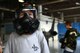 A Team Shaw child tries on a gas mask during the Kids Meet the Viper event at Shaw Air Force Base, S.C., Sept. 23, 2015. The gas mask is part of the Mission Oriented Protective Posture gear issued to Airmen, which would be used in the event of chemical, biological, radiological, or nuclear threats. (U.S. Air Force photo by Airman 1st Class Kelsey Tucker/Released)