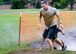 U.S. Air Force Airmen finishes the trench obstacle and prepares to take on the next obstacle during a 20th Fighter Wing Comprehensive Airmen Fitness obstacle course at Shaw Air Force Base, S.C., Sept. 25, 2015.  Airmen had to complete a total of eight obstacles, with varying difficulties and terrain conditions. (U.S. Air Force photo by Airman 1st Class Christopher Maldonado/Released)