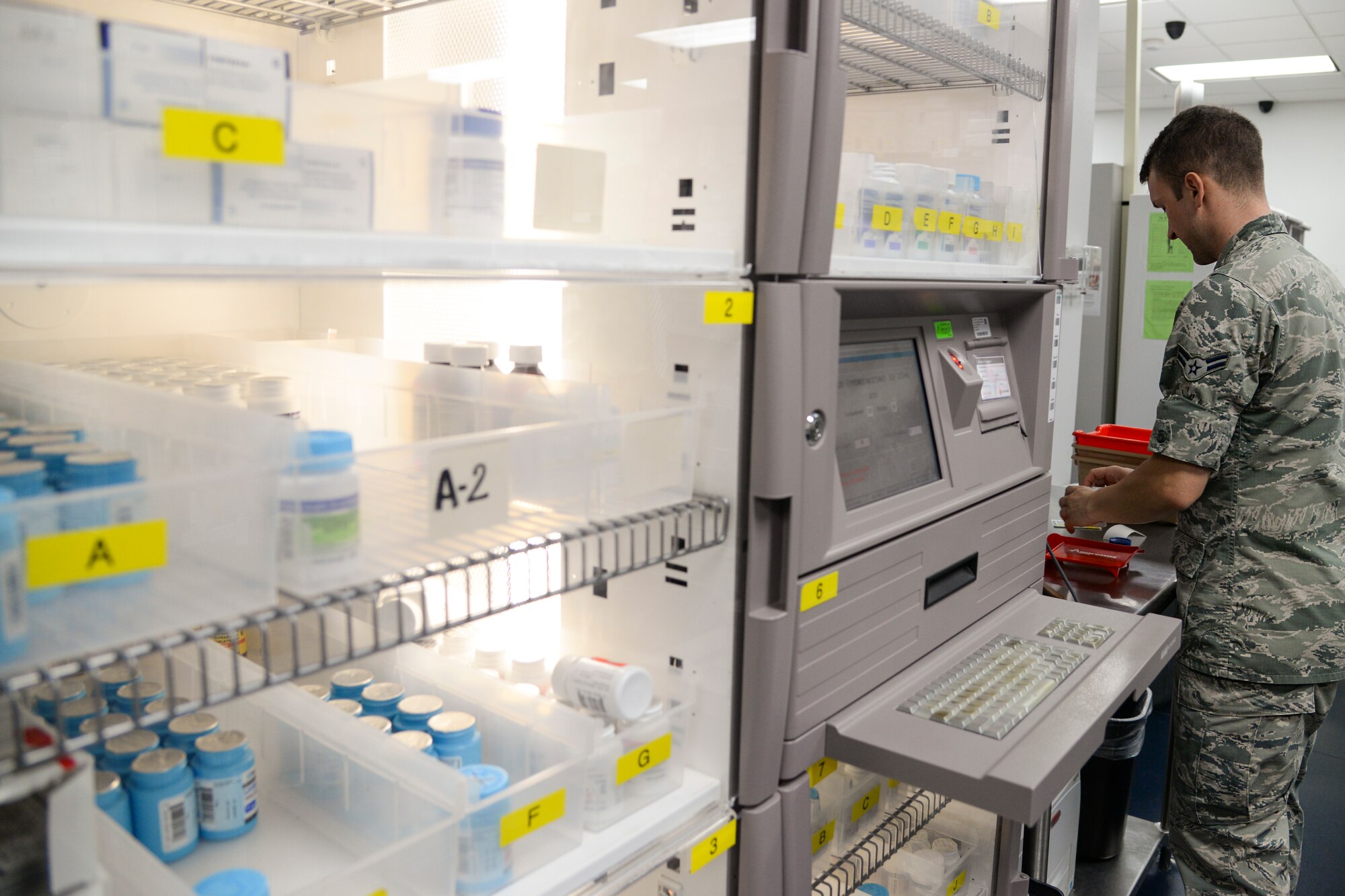 Airman 1st Class Cameran Vincent, 2nd Medical Support Squadron narcotics custodian, fills a prescription at Barksdale Air Force Base, La., Sept. 24, 2015. Controlled substances are stored in a secure locker which can only be accessed by pharmacy technicians. (U.S. Air Force photo/Senior Airman Jannelle Dickey)