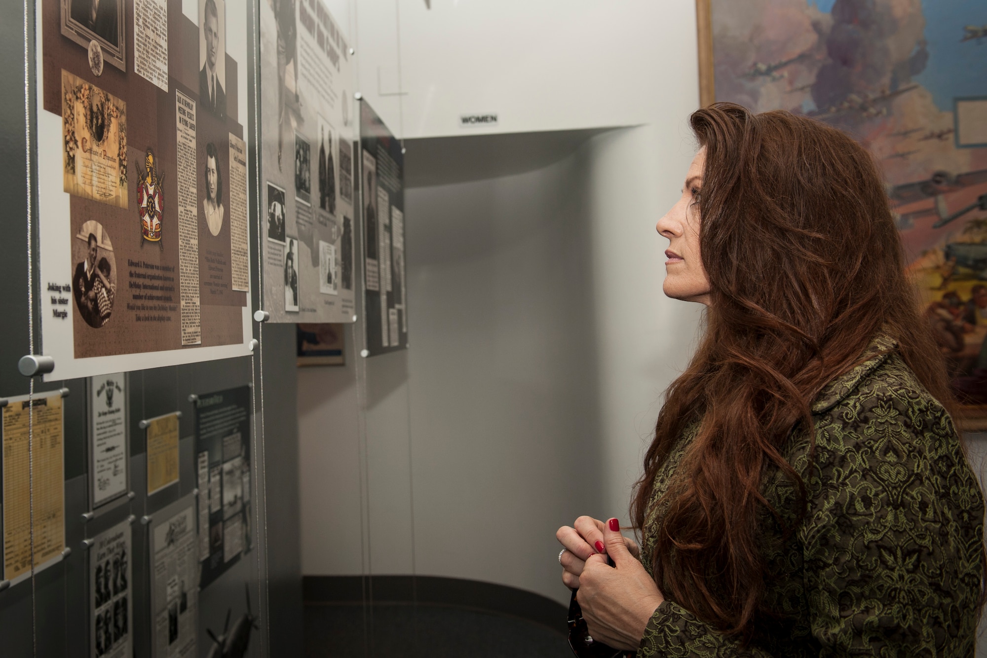 PETERSON AIR FORCE BASE, Colo. – Sandy Aragon Kruse, daughter of Staff Sgt. Jose Aragon, tours the base museum Sept. 25, 2015. She visited Peterson to tour the Aragon Dining Facility, named after her father who was the first Colorado service member to die in the Vietnam War. The visit to the museum showcased the history of the base and also displayed artifacts that are planned to be used in another display at the museum honoring her father. (U.S. Air Force photo by Airman 1st Class Rose Gudex)