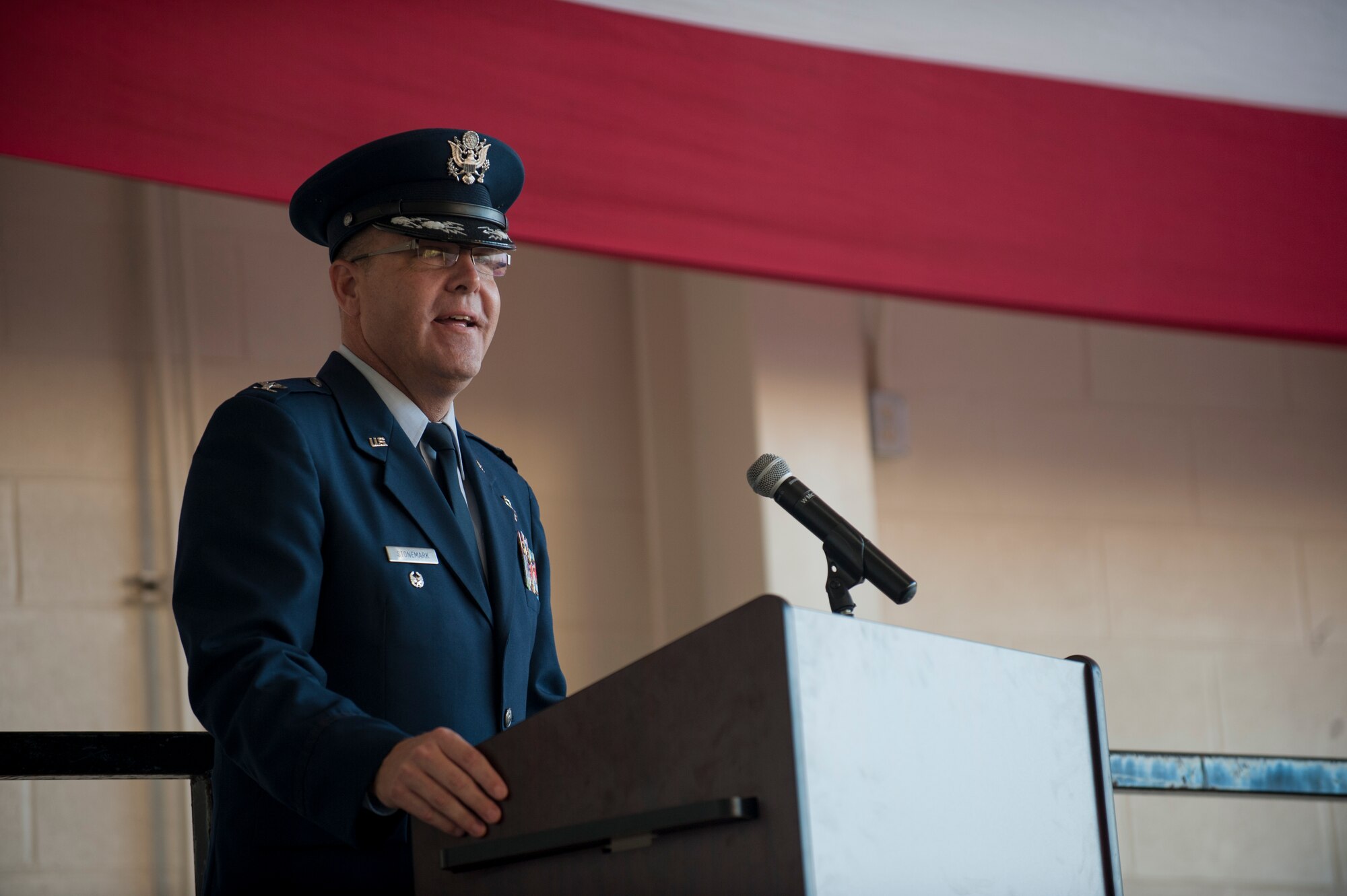 U.S. Air Force Col. Robert Stonemark, 12th Air Force chief of staff, speaks during 7th Bomb Wing transition to Air Force Global Strike Command ceremony Sept. 28, 2015, at Dyess Air Force Base, Texas. Two bomb wings from the U.S. Air Force’s Air Combat Command, the 7th Bomb Wing at Dyess and the 28th BW at Ellsworth AFB, S.D., will realign to Air Force Global Strike Command’s 8th Air Force on Oct. 1st, bringing the entire Air Force bomber fleet under a single command. (U.S. Air Force photo by Airman Quay Drawdy/Released)