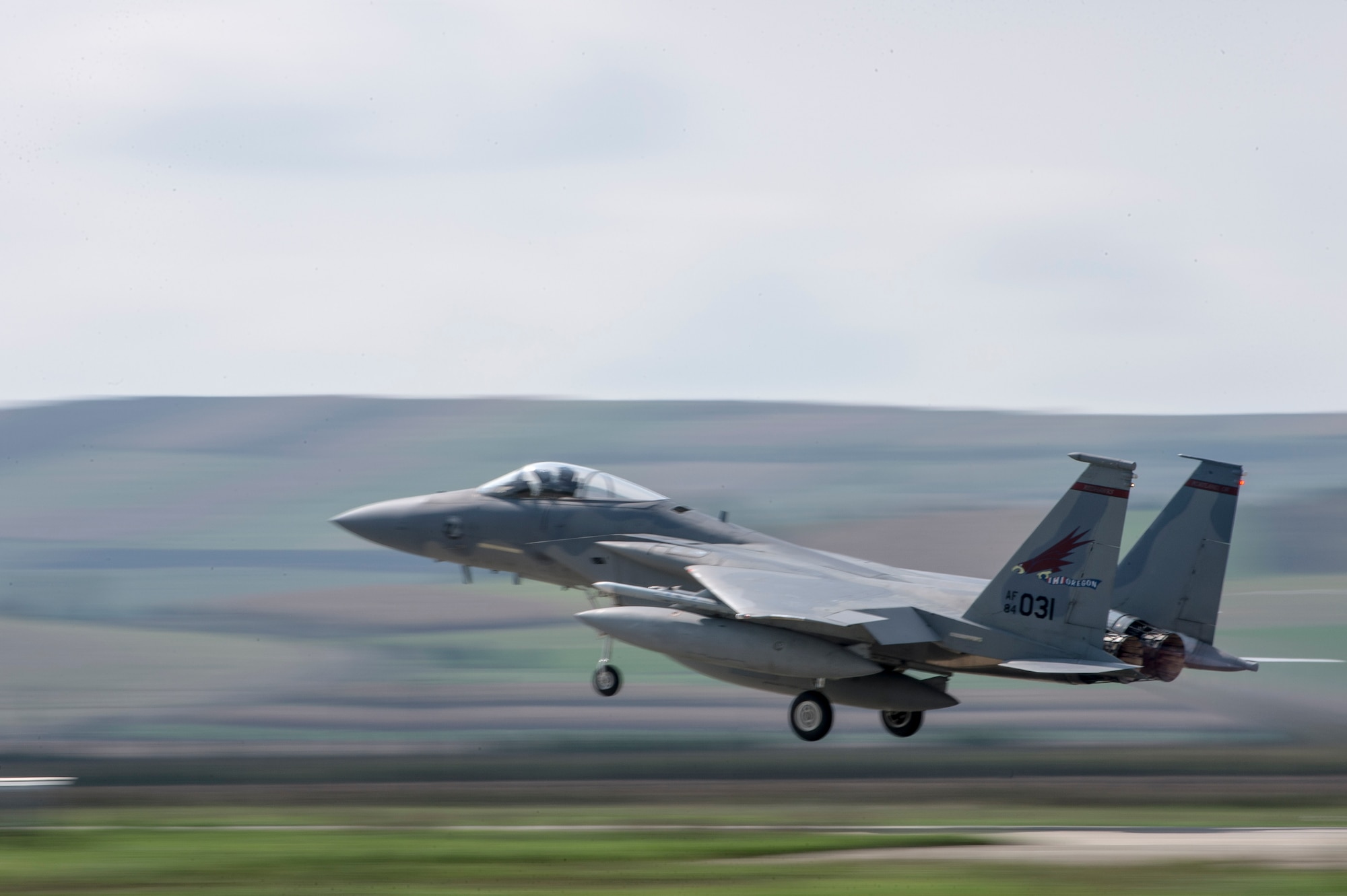 An F-15C Eagle fighter aircraft assigned to the 123rd Expeditionary Fighter Squadron, 142nd Fighter Wing, Oregon Air National Guard, takes off from the runway during a theater security package deployment Sept. 25, 2015, at Campia Turzii, Romania. The first TSP concludes with the departure of the 123rd EFS but a constant presence remains in Europe with the arrival of U.S. Air Force A-10C Thunderbolt IIs attack aircraft from the 74th Expeditionary Fighter Squadron, 23rd Wing at Moody Air Force Base, Ga. (U.S. Air Force photo by Staff Sgt. Christopher Ruano/Released)