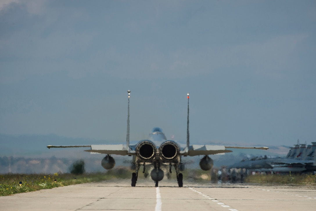 An F-15C Eagle fighter aircraft pilot assigned to the 123rd Expeditionary Fighter Squadron, 142nd Fighter Wing, Oregon Air National Guard, taxis during a theater security package deployment Sept. 25, 2015, at Campia Turzii, Romania. U.S. and Romanian air forces conducted training aimed at strengthening interoperability and demonstrated the countries' shared commitment to the security and stability of Europe. (U.S. Air Force photo by Staff Sgt. Christopher Ruano/Released)