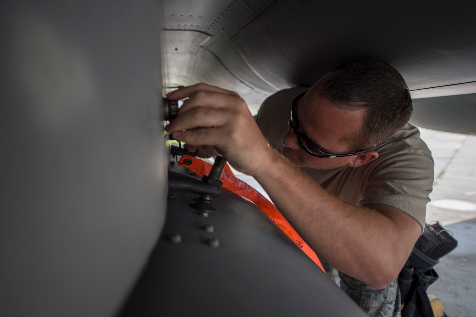 A crew chief from the 123rd Expeditionary Fighter Squadron, 142nd Fighter Wing, Oregon Air National Guard, performs pre-flight checks on an F-15C Eagle fighter aircraft during a theater security package deployment Sept. 25, 2015, at Campia Turzii, Romania. The U.S. Air Force’s forward presence in Europe allows cooperation among NATO allies and partners to develop and improve ready air forces capable of maintaining regional security. (U.S. Air Force photo by Staff Sgt. Christopher Ruano/Released)