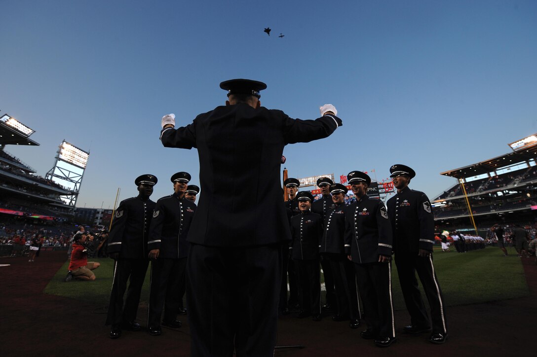 The U.S. Air Force Singing Sergeants sing the national anthem at Nationals Park in Washington D.C., Sept. 18, 2015. The Washington Nationals hosted a game honoring the Air Force's birthday. (U.S. Air Force photo/Senior Airman Hailey Haux)