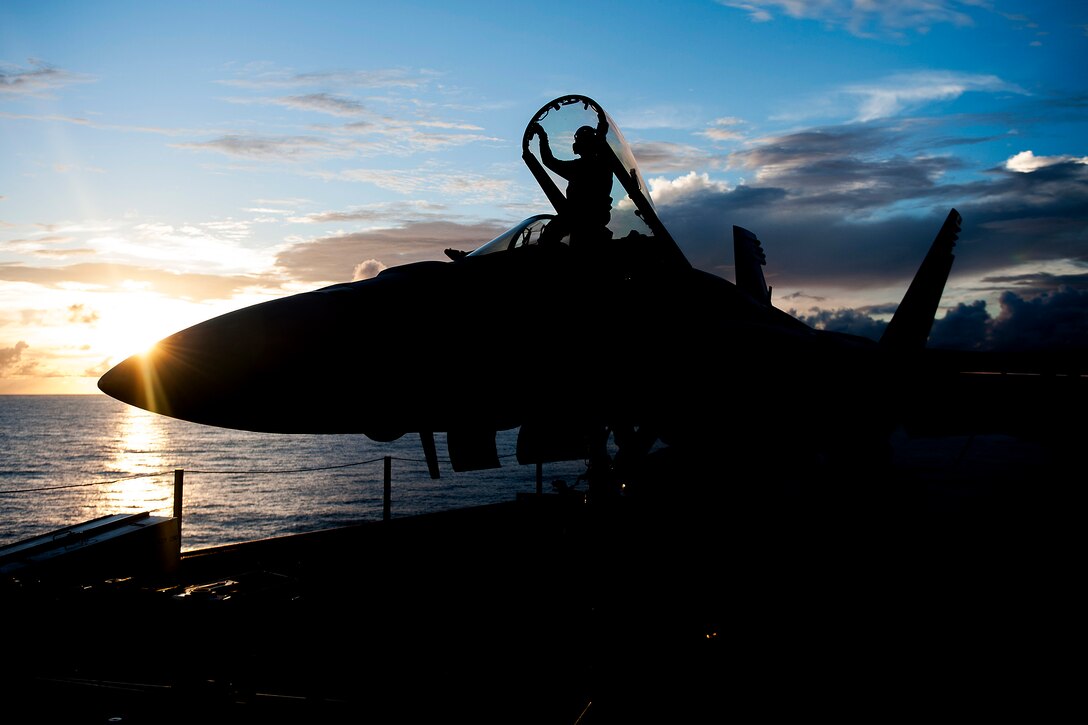 Navy Petty Officer 3rd Class J. Magsipoc performs maintenance on an F/A-18E Super Hornet on the flight deck of the aircraft carrier USS Harry S. Truman in the Atlantic Ocean, Sept. 25, 2015. The Harry S. Truman Carrier Strike Group is training to prepare for a future deployment. Magsipoc is assigned to Strike Fighter Squadron 25. U.S. Navy photo by Seaman L. A. Preston