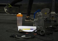 Airman 1st Class Paige Ryser, National Air and Space Intelligence Agency personnel specialist, trains Friday, Sept. 18, 2015 at the Wright Field Fitness Center. Ryser follows a strict routine while preparing for her bodybuilding competitions. She works out six days per week and includes lifting, cardio and sprints in her workout routine, along with a strict diet program. (U.S. Air Force photo by Senior Airman Justyn Freeman)