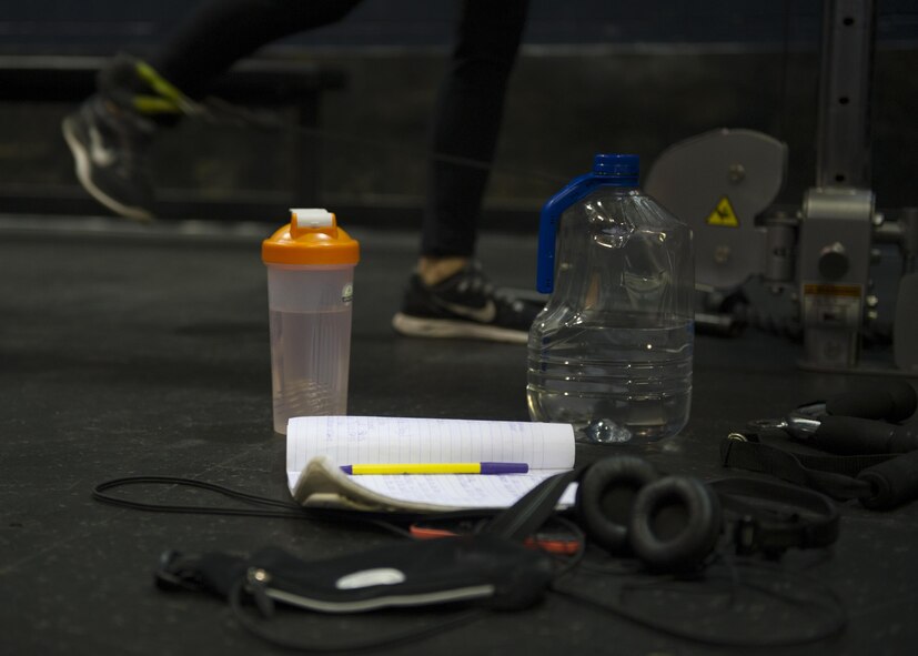 Airman 1st Class Paige Ryser, National Air and Space Intelligence Agency personnel specialist, trains Friday, Sept. 18, 2015 at the Wright Field Fitness Center. Ryser follows a strict routine while preparing for her bodybuilding competitions. She works out six days per week and includes lifting, cardio and sprints in her workout routine, along with a strict diet program. (U.S. Air Force photo by Senior Airman Justyn Freeman)