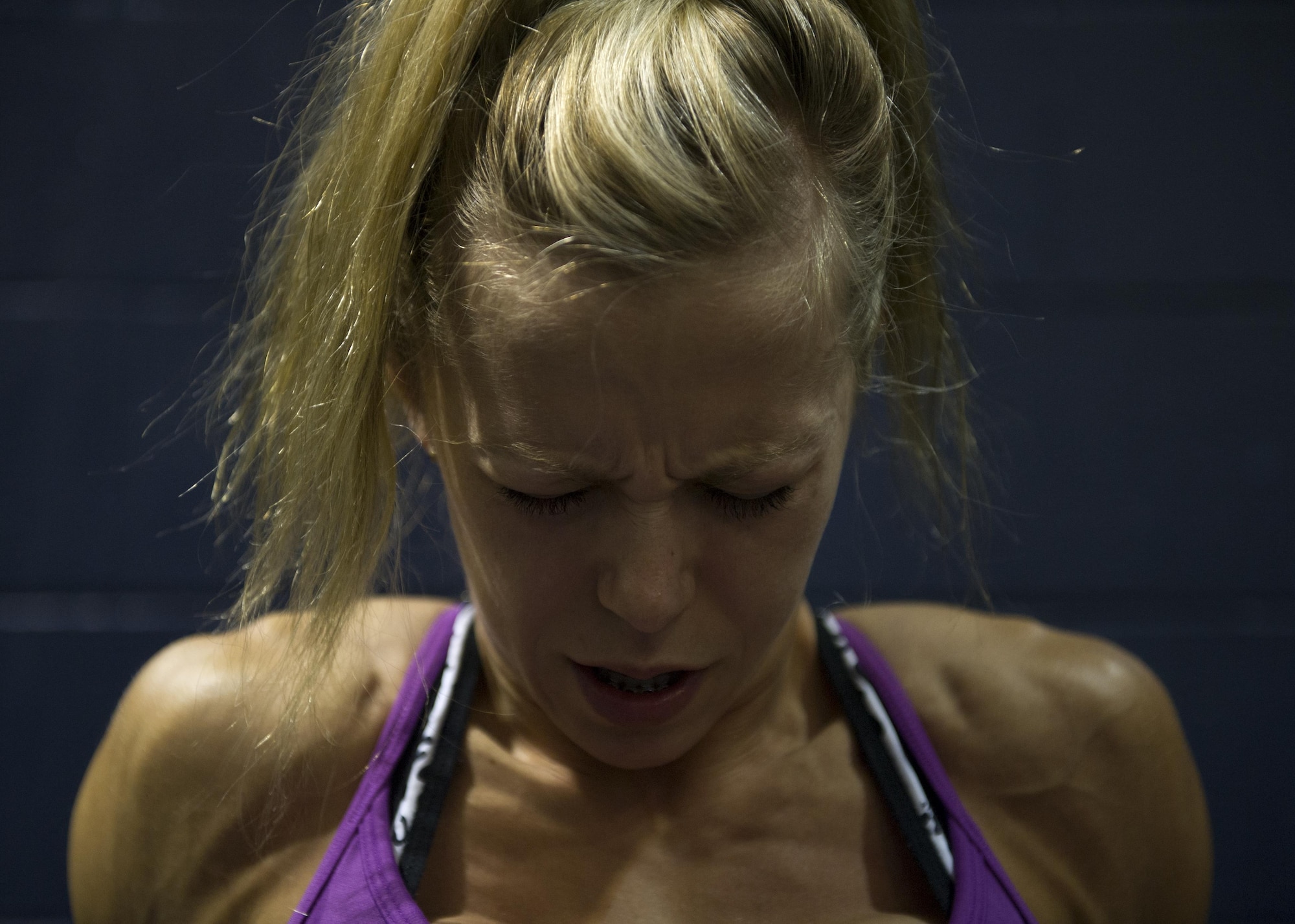 Airman 1st Class Paige Ryser, National Air and Space Intelligence Agency personnel specialist, trains Friday, Sept. 18, 2015 at the Wright Field Fitness Center. Ryser has lost 15 pounds and 2 percent body fat in the last 22 weeks while preparing for her bodybuilding competitions. She works out six days per week and includes lifting, cardio and sprints in her workout routine, along with a strict diet program. (U.S. Air Force photo by Senior Airman Justyn Freeman)