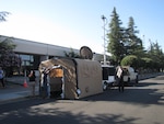 The DLA Information Technology Contingency team stood up the Mobile Emergency Response Center at DLA Distribution San Joaquin, Calif., during an installation-wide communication outage. The satellite communications provided enabled the Emergency Support Operations Center to process emergent materiel release orders.