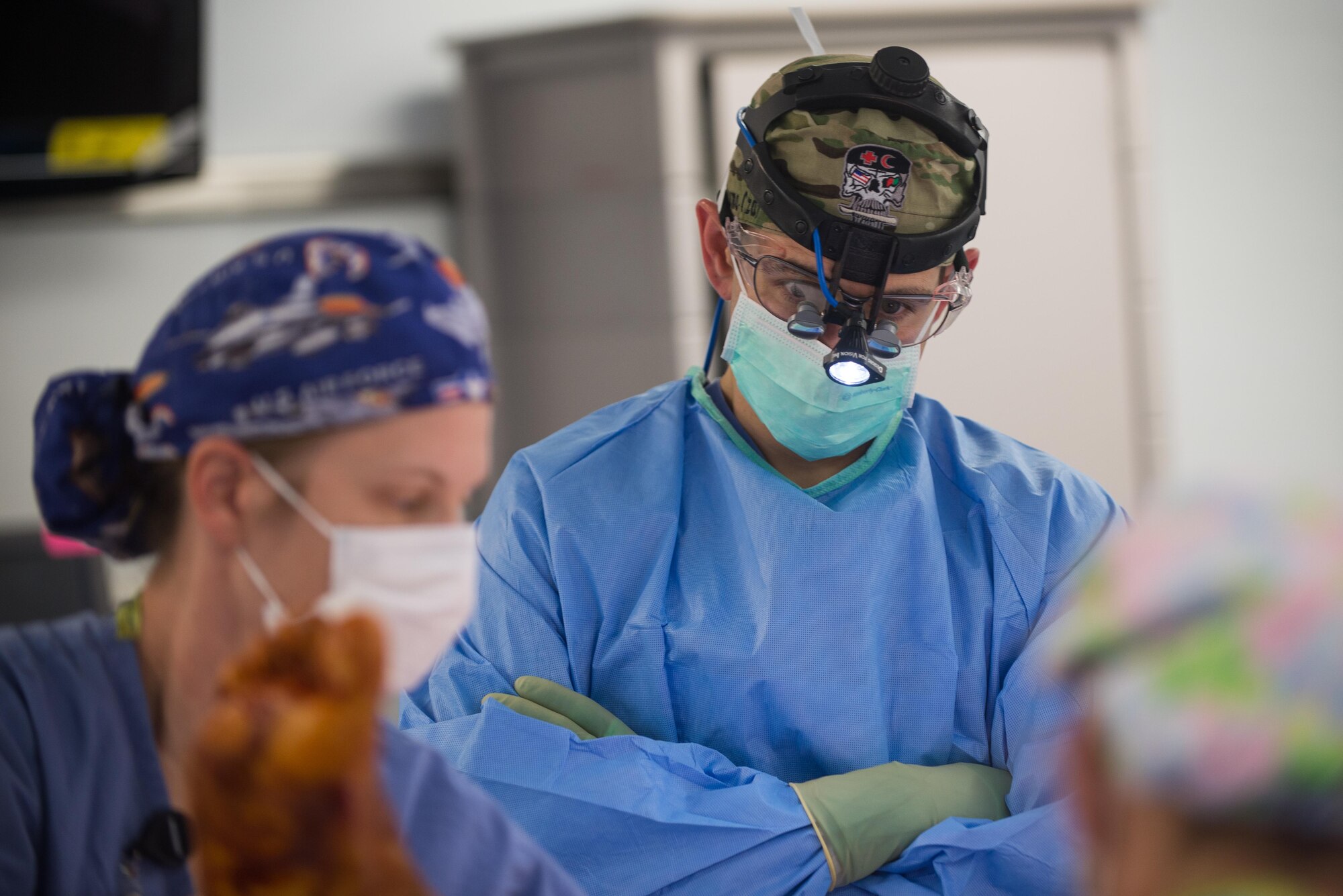 U.S. Air Force Maj. Stephen Varga, 455th Expeditionary Medical Group trauma czar, looks on as an Afghan National Defense and Security Forces soldier who sustained trauma from a gunshot is prepared for surgery at the Craig Joint Theater Hospital, Bagram Airfield Afghanistan, Sept. 26, 2015. The CJTH provides surgical capabilities in trauma, general surgery, orthopedics, neurosurgery, urology, vascular surgery and otolaryngology, all of which are critical to helping 98 percent of patients who come to the hospital survive their injuries. (U.S. Air Force photo by Tech. Sgt. Joseph Swafford/Released)