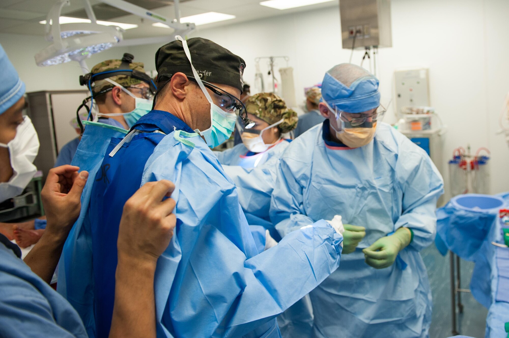 U.S. Airmen assigned to the 455th Expeditionary Medical Group prepare to perform surgery on an Afghan National Defense and Security Forces soldier who sustained trauma from a gunshot at the Craig Joint Theater Hospital, Bagram Airfield Afghanistan, Sept. 26, 2015. The CJTH provides surgical capabilities in trauma, general surgery, orthopedics, neurosurgery, urology, vascular surgery and otolaryngology, all of which are critical to helping 98 percent of patients who come to the hospital survive their injuries. (U.S. Air Force photo by Tech. Sgt. Joseph Swafford/Released)