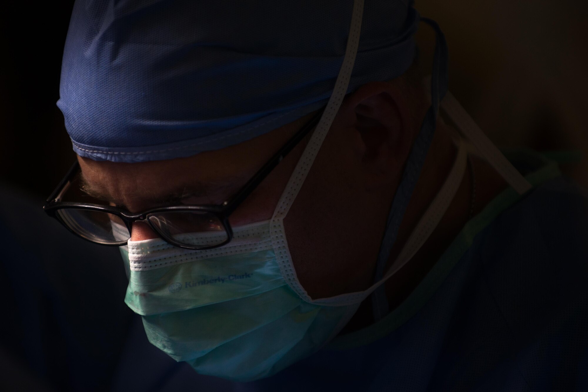 A U.S. Airman assigned to the 455th Expeditionary Medical Group assists during surgery on an Afghan National Defense and Security Forces soldier who sustained trauma from a gunshot at the Craig Joint Theater Hospital, Bagram Airfield Afghanistan, Sept. 26, 2015. The CJTH provides surgical capabilities in trauma, general surgery, orthopedics, neurosurgery, urology, vascular surgery and otolaryngology, all of which are critical to helping 98 percent of patients who come to the hospital survive their injuries. (U.S. Air Force photo by Tech. Sgt. Joseph Swafford/Released)