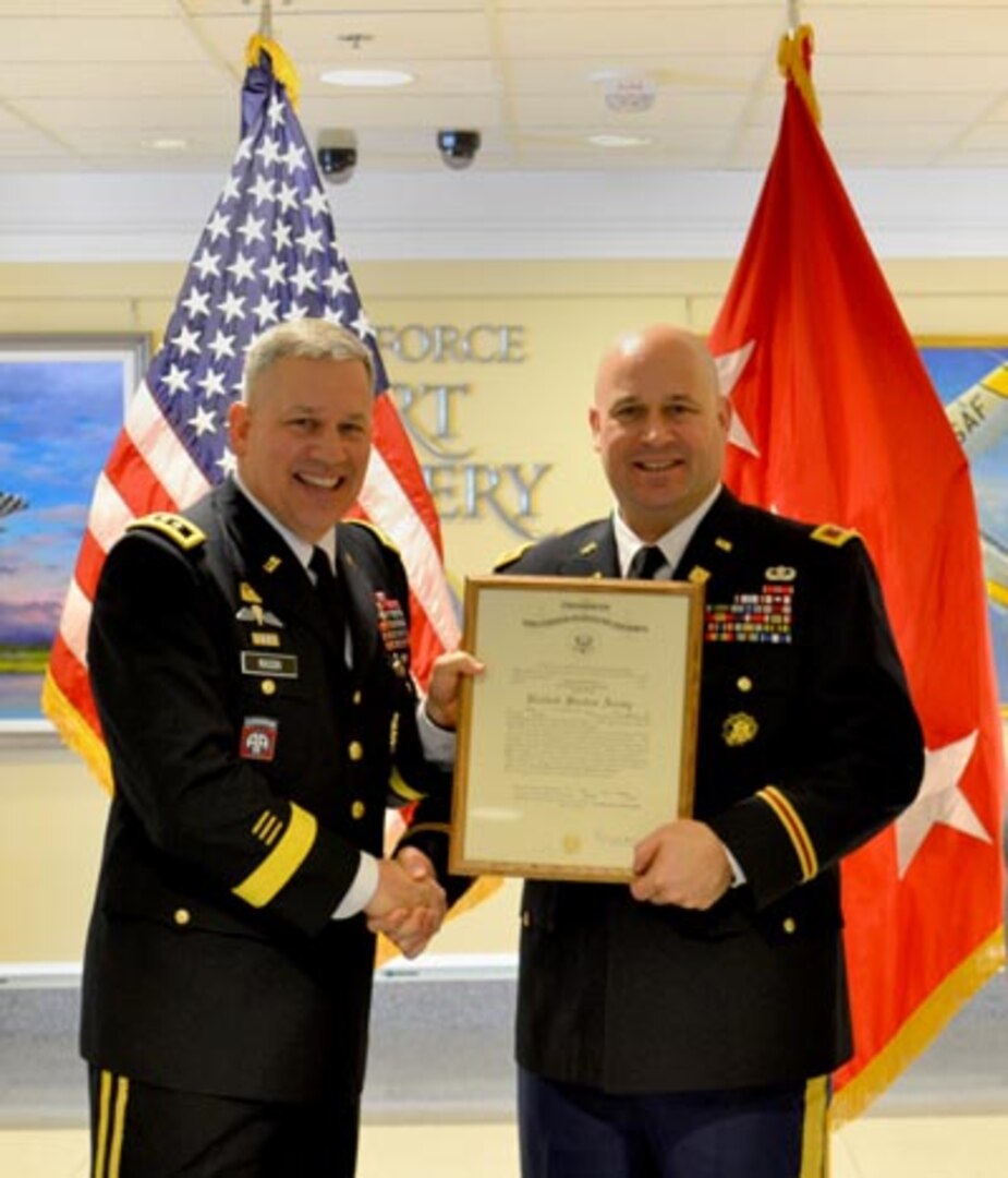 Lt. Gen. Raymond V. Mason, the Army G4 (Deputy Chief of Staff, G-4 (Logistics)) at left, stands with Army Col. Wayne J. Bondy, Jr., after Bondy's Pentagon promotion ceremony last year. Photo courtesy of Wayne Bondy, Sr.