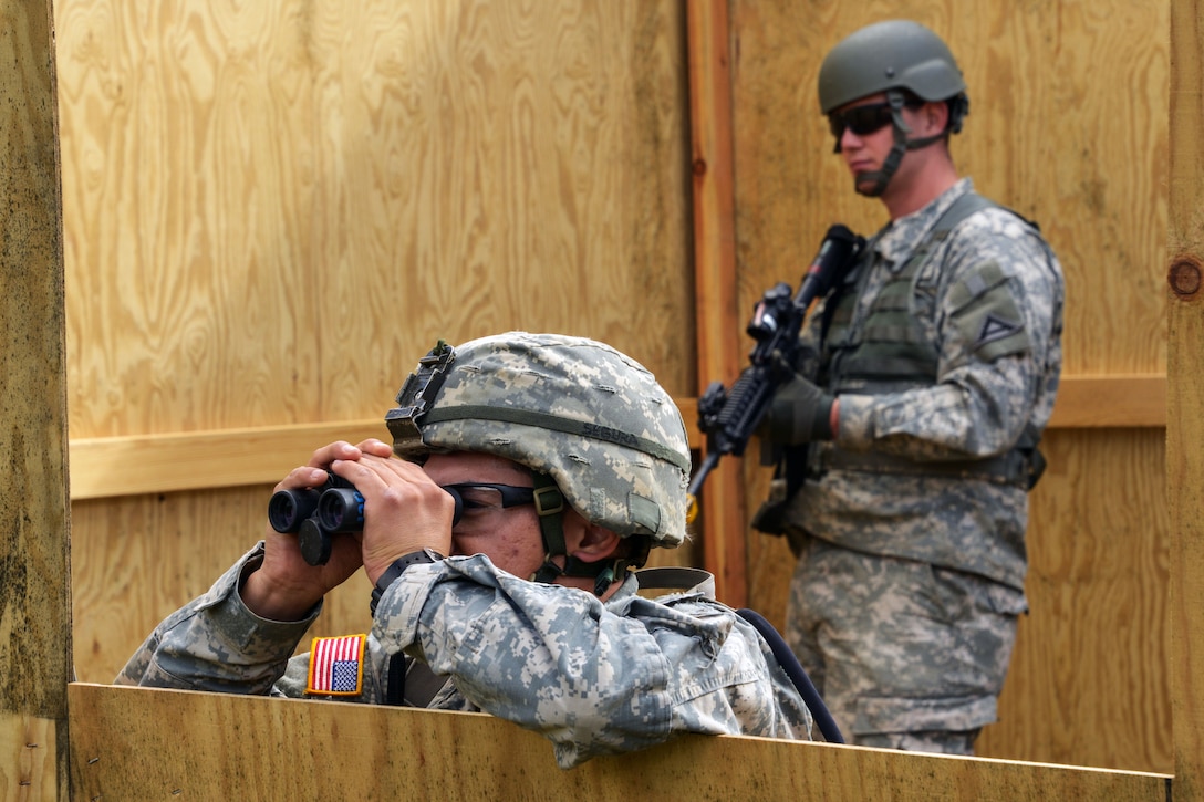 U.S. Army Expert Infantryman Badge candidate Spc. Derek Segura, assigned to C Company, 1st Battalion, 4th Infantry Regiment, conducts range estimation during the Joint Multinational Readiness Center's competition at the Hohenfels Training Area, Germany, Sept. 29, 2015. U.S. Army photo by Markus Rauchenberger