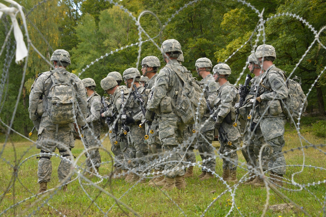 U.S. Army Expert Infantryman Badge candidates stationed on the Joint Multinational Readiness Center wait at a holding area during the competition on the Hohenfels Training Area, Germany, Sept. 29, 2015. U.S. Army photo by Markus Rauchenberger