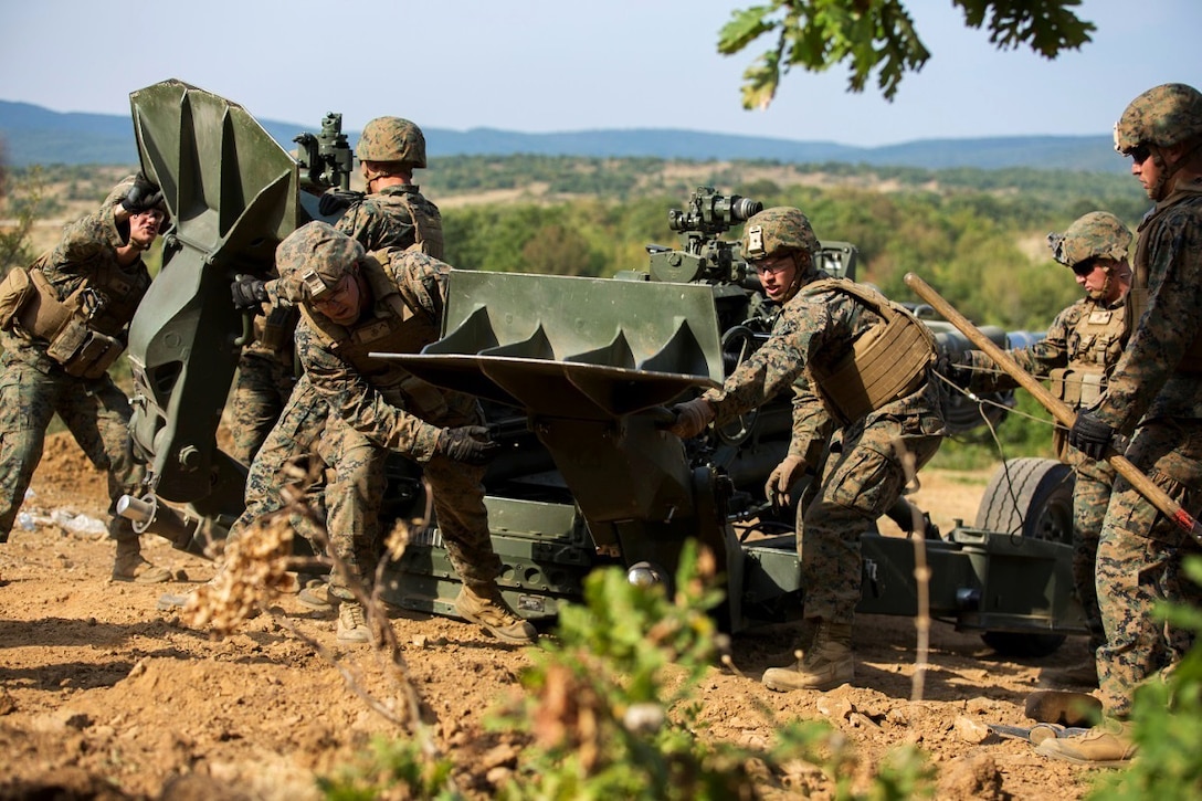 U.S. Marines prepare a M777-A2 howitzer during a direct-fire exercise at Novo Selo Training Area, Bulgaria, Sept. 22, 2015. U.S. Marine Corps photo by Melanye E. Martinez