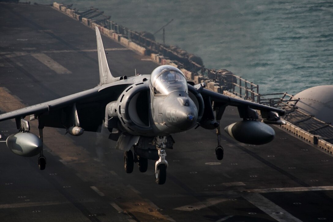 ARABIAN GULF (Sept. 29, 2015) An AV-8B Harrier with Marine Medium Tiltrotor Squadron 161 (Reinforced), 15th Marine Expeditionary Unit, lands aboard the amphibious assault ship USS Essex (LHD 2). The 15th Marine Expeditionary Unit, embarked aboard the ships of the Essex Amphibious Ready Group, is deployed to maintain regional security in the U.S. 5th Fleet area of operations. (U.S. Marine Corps photo by Cpl. Anna Albrecht/Released)