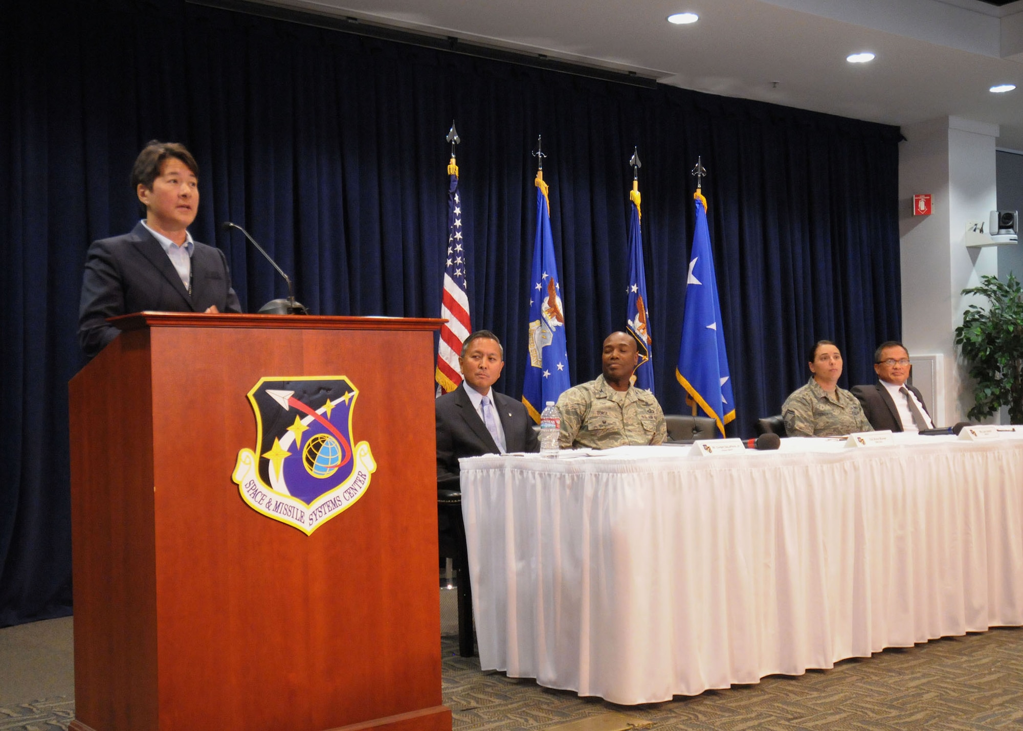 Lani Smith, the executive director of the Space Superiority Systems Directorate, speaks about her experiences during the 2015 Space and Missile Systems Center’s Diversity Day panel discussion, Sept 23, 2015, in the Gordon Conference Center at the Schriever Space Complex at Los Angeles Air Force Base, Calif. This year’s event featured a panel discussion, performances showcasing the talents of base employees, ethnic foods and informational displays. (U.S. Air Force photo/Sarah Corrice)