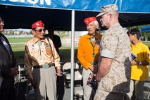U.S. Marine Corps Col. Christopher S. Dowling (right), chief of staff of 1st Marine Division speaks with Samuel Holiday (left) and Roy Hawthorne, during the Navajo Code Talker tour on Marine Corps Base Camp Pendleton, Calif., Sept. 28, 2015. The Navajo code talkers took part in every assault the U.S. Marines conducted in the Pacific from 1942 to 1945. They served in all six Marine divisions, Marine Raider Battalions and Marine parachute units, transmitting messages by telephone and radio in their native language that enemy forces were never able to break. (U.S. Marine Corps photo by Lance Cpl. Adrianna R. Lincoln 1st Marine Division Combat Camera/Released)