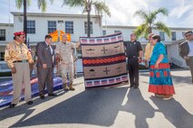 U.S. Marine Corps Maj. Gen. Daniel J. O'Donohue, Commanding General of 1st Marine Division receives a quilt from a member of the Navajo Nation during a visit to Marine Corps Base Camp Pendleton, Calif., Sept. 28, 2015. The Navajo code talkers took part in every assault the U.S. Marines conducted in the Pacific from 1942 to 1945. They served in all six Marine divisions, Marine Raider Battalions and Marine parachute units, transmitting messages by telephone and radio in their native language that enemy forces were never able to break. (U.S. Marine Corps photo by Lance Cpl. Adrianna R. Lincoln 1st Marine Division Combat Camera/Released)