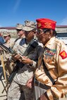 Navajo Code Talker Samuel T. Holiday, a native of Kayenta, Ariz., listens to an incoming radio transmission during a visit to Marine Corps Base Camp Pendleton, Calif., Sept. 28, 2015. The Navajo code talkers took part in every assault the U.S. Marines conducted in the Pacific from 1942 to 1945. They served in all six Marine divisions, Marine Raider Battalions and Marine parachute units, transmitting messages by telephone and radio in their native language that enemy forces were never able to break. (U.S. Marine Corps photo by Lance Cpl. Adrianna R. Lincoln 1st Marine Division Combat Camera/ Released)