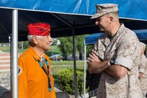 U.S. Marine Corps Maj. Gen. Daniel J. O'Donohue, Commanding General of 1st Marine Division, speaks with Navajo Code Talker Roy Hawthorn during a visit to Marine Corps Base Camp Pendleton, Calif., Sept. 28, 2015. The Navajo code talkers took part in every assault the U.S. Marines conducted in the Pacific from 1942 to 1945. They served in all six Marine divisions, Marine Raider Battalions and Marine parachute units, transmitting messages by telephone and radio in their native language that enemy forces were never able to break. (U.S. Marine Corps photo by Lance Cpl. Adrianna R. Lincoln 1st Marine Division Combat Camera/ Released)