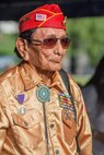 Navajo Code Talker Samuel T. Holiday, a native of Kayenta, Ariz., looks on during a commemoration ceremony for the Navajo Code Talkers at Marine Corps Base Camp Pendleton, Calif., Sept. 28, 2015. The Navajo code talkers took part in every assault the U.S. Marines conducted in the Pacific from 1942 to 1945. They served in all six Marine divisions, Marine Raider Battalions and Marine parachute units, transmitting messages by telephone and radio in their native language that enemy forces were never able to break. (U.S. Marine Corps photo by Lance Cpl. Adrianna R. Lincoln 1st Marine Division Combat Camera/ Released)