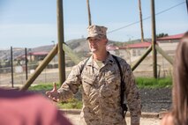 U.S. Marine Corps Master Sgt. Brian K. Cox, telecommunications systems chief with A Company, 9th Communications Battalion, I Marine Expeditionary Force Headquarters Group, speaks with members of the Navajo Nation during a visit to Marine Corps Base Camp Pendleton, Calif., Sept. 28, 2015. The Navajo code talkers took part in every assault the U.S. Marines conducted in the Pacific from 1942 to 1945. They served in all six Marine divisions, Marine Raider Battalions and Marine parachute units, transmitting messages by telephone and radio in their native language that enemy forces were never able to break. (U.S. Marine Corps photo by Lance Cpl. Adrianna R. Lincoln 1st Marine Division Combat Camera/ Released)