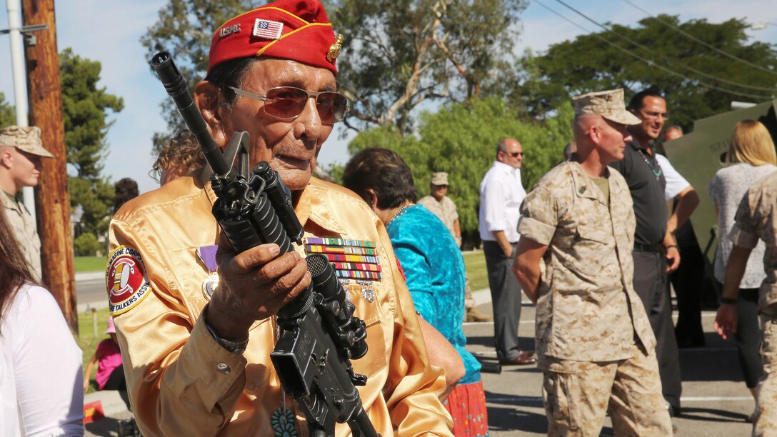 Marine Corps Base Camp Pendleton hosts a commemoration ceremony for the Navajo Code Talkers at 1st Marine Division Headquarters, Sept. 28. Navajo Code Talkers Roy Hawthorne and Samuel T. Holiday were present to talk about their experiences. Maj. Gen. Daniel D. O'Donohue, Commanding General, 1st Marine Division, gave his remarks and was presented with a Navajo blanket. During World War II, the U.S. Marine Corps, in an effort to find quicker and more secure ways to send and receive code enlisted Navajos as "code talkers." The first 29 Navajo recruits attended boot camp in May 1942. This first group created the Navajo code at Camp Pendleton, Oceanside, Calif.