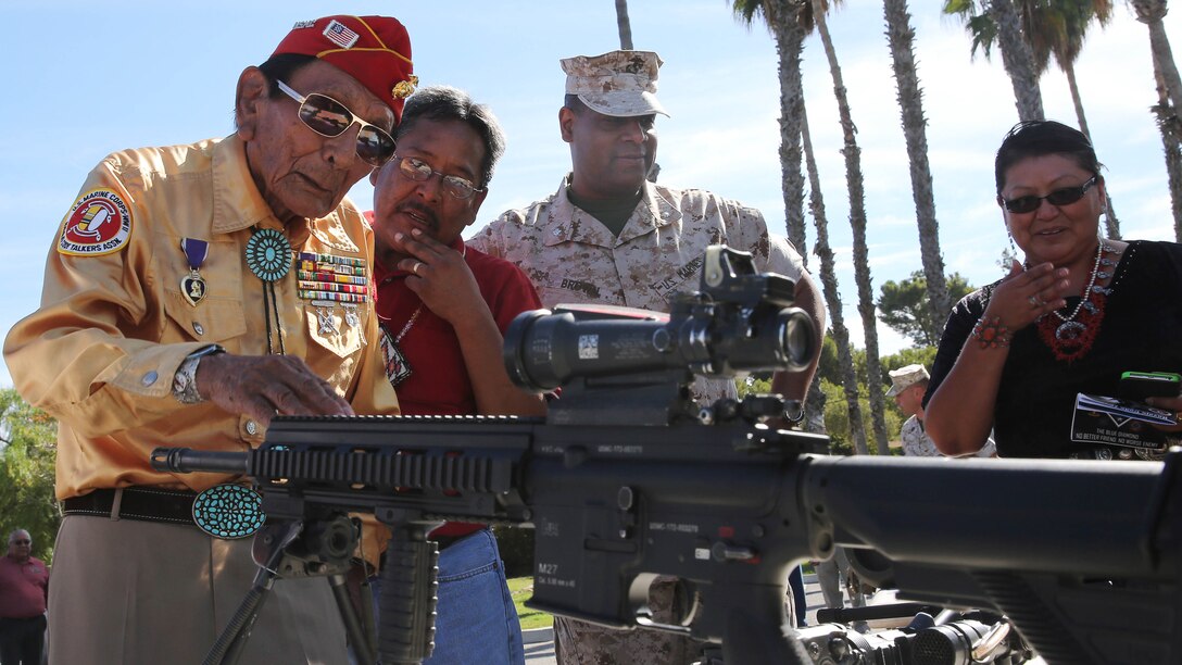 Marine Corps Base Camp Pendleton hosts a commemoration ceremony for the Navajo Code Talkers at 1st Marine Division Headquarters, Sept. 28. 2015, Navajo Code Talkers Roy Hawthorne and Samuel T. Holiday were present to talk about their experiences. Maj. Gen. Daniel D. O'Donohue, Commanding General, 1st Marine Division, gave his remarks and was presented with a Navajo blanket. During World War II, the U.S. Marine Corps, in an effort to find quicker and more secure ways to send and receive code enlisted Navajos as "code talkers." The first 29 Navajo recruits attended boot camp in May 1942. This first group created the Navajo code at Camp Pendleton, Oceanside, Calif. 