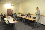 Lt. Col. Jason Campbell, 502nd Security Forces and Logistics Support Group deputy commander, briefs Air Force spouses on the 502nd SFLSG mission during a Heart Link briefing Sept. 10 at Joint Base San Antonio-Randolph. 

