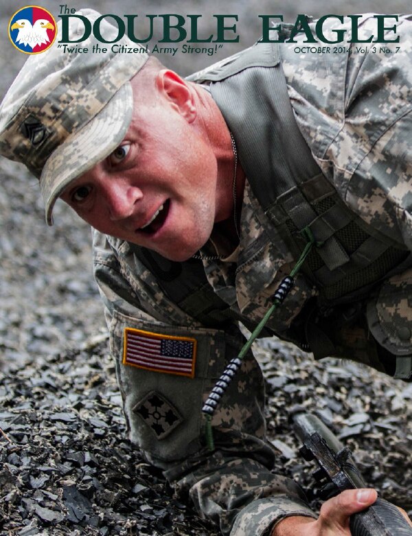 COVER STORY:
Staff Sgt. Christopher Croslin, 95th
Training Division (IET), U.S. Army
Reserve, tackles the obstacle course
during day 2 at the 2014 Army Drill
Sergeant of the Year Competition
at Fort Jackson, S.C. Croslin is one
of two competitors from the 108th
Training Command (IET) fighting for
the title of Army Reserve Drill Sergeant
of the Year. (Photo by Sgt. 1st
Class Brian Hamilton/108th Training
Command)