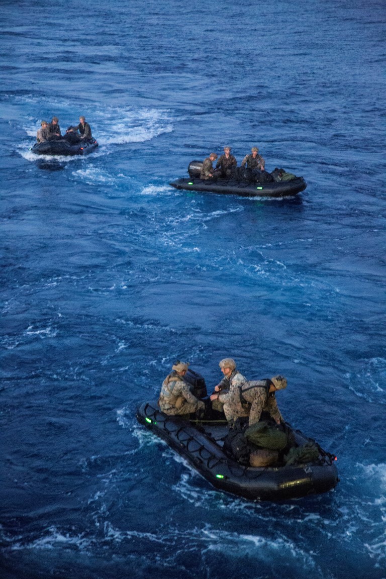 U.S. Marines with the Maritime Raid Force, 13th Marine Expeditionary Unit (MEU), 1st Marine Expeditionary Force, disembark from the USS New Orleans utilizing a combat rubber raid craft during the PHIBRON-MEU integration exercise off the coast of San Clemente Island, Sept. 25, 2015. This marks the first at-sea exercise for the PHIBRON-MEU Marines and Sailors as they work together in preparation for deployment to the Pacific and Central Command areas of responsibility in early 2016. (U.S. Marine Corps photo by Sgt. Tyler C. Gregory/released)