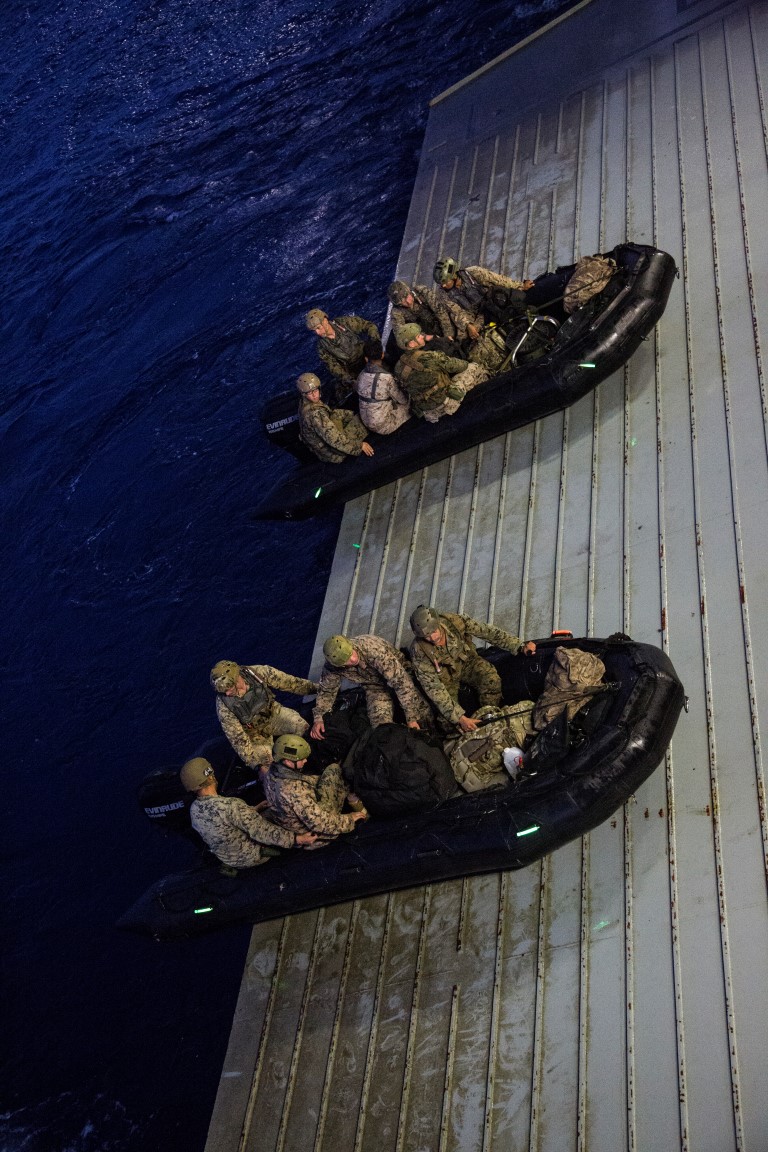 U.S. Marines with the Maritime Raid Force, 13th Marine Expeditionary Unit (MEU), 1st Marine Expeditionary Force, disembark from the USS New Orleans utilizing a combat rubber raid craft during the PHIBRON-MEU integration exercise off the coast of San Clemente Island, Sept. 25, 2015. This marks the first at-sea exercise for the PHIBRON-MEU Marines and Sailors as they work together in preparation for deployment to the Pacific and Central Command areas of responsibility in early 2016. (U.S. Marine Corps photo by Sgt. Tyler C. Gregory/released)