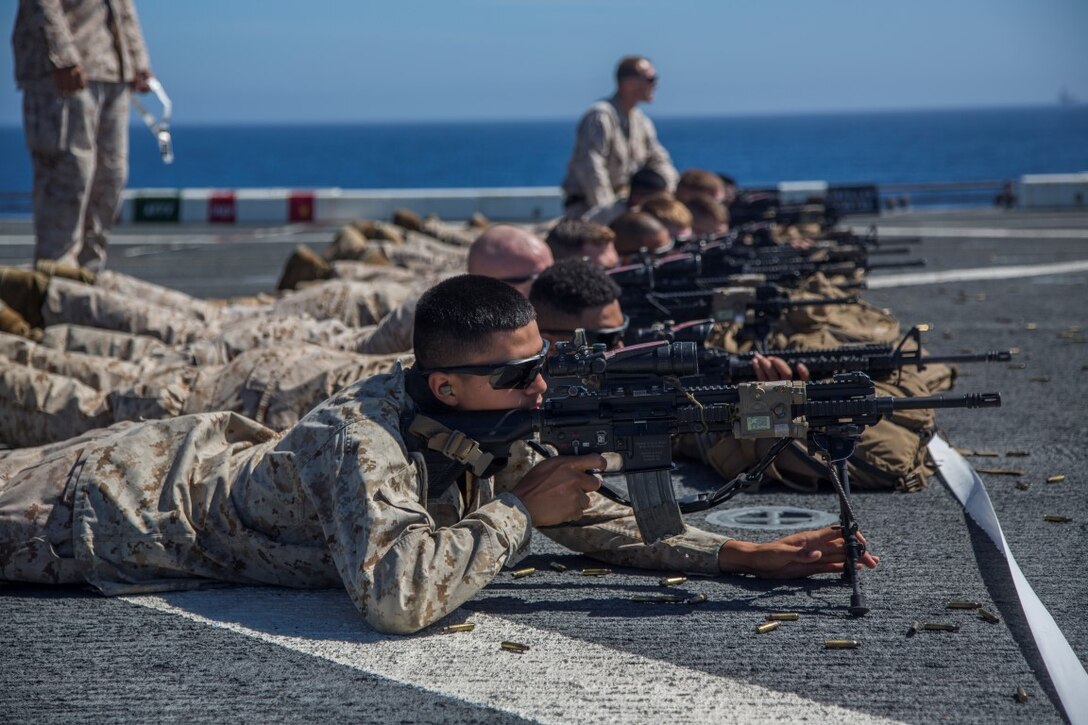 U.S. Marines with Fox Company, 2nd Battalion, 1st Marine Regiment attached to the 13th Marine Expeditionary Unit, 1st Marine Expeditionary Force conduct a battlesight zero while aboard the USS New Orleans during the PHIBRON-MEU integration exercise off the coast of San Clemente Island, Sept. 26, 2015. This marks the first at-sea exercise for the PHIBRON-MEU Marines and Sailors as they work together in preparation for deployment to the Pacific and Central Command areas of responsibility in early 2016. (U.S. Marine Corps photo by Sgt. Tyler C. Gregory/released)