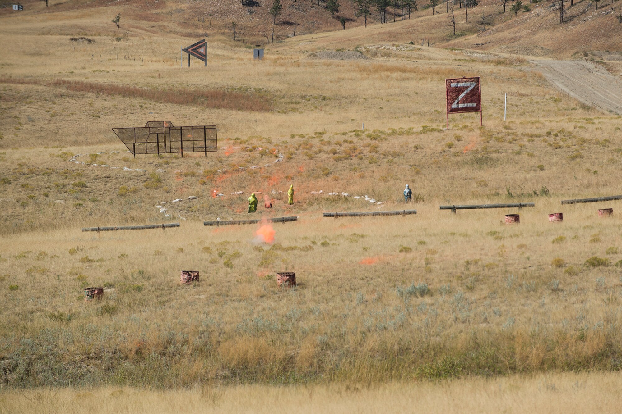 An M203 grenade impacts the ground after being fired by a member of the 307th Security Forces Squadron during the Weapons Firing Challenge on Sept. 23, 2015, Camp Guernsey Joint Training Center, Wyo. The challenge consists of teams being evaluated on their marksmanship using the M4 rifle, M9 pistol, M240 machine gun and the M203 grenade launcher. (U.S. Air Force photo by Master Sgt. Greg Steele/Released)