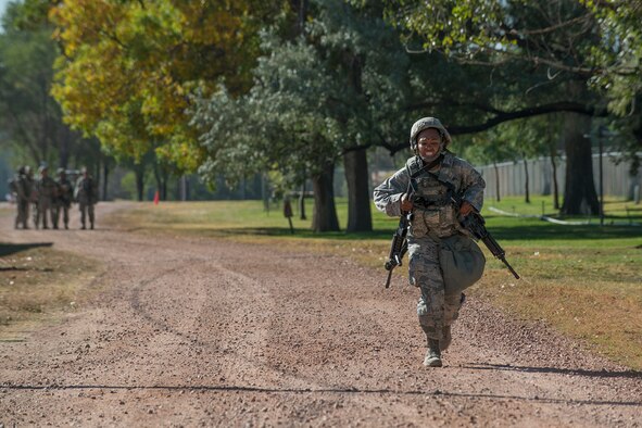 U.S. Air Force Senior Airman Malachia Jones, 307th Security Forces Squadron, races for the finish line as part of the Warrior Run Challenge on Sept. 25, 2015, Camp Guernsey Joint Training Center, Wyo. The challenge consists of a team run, a HUMVEE push and a buddy carry through the finish line. (U.S. Air Force photo by Master Sgt. Greg Steele/Released)