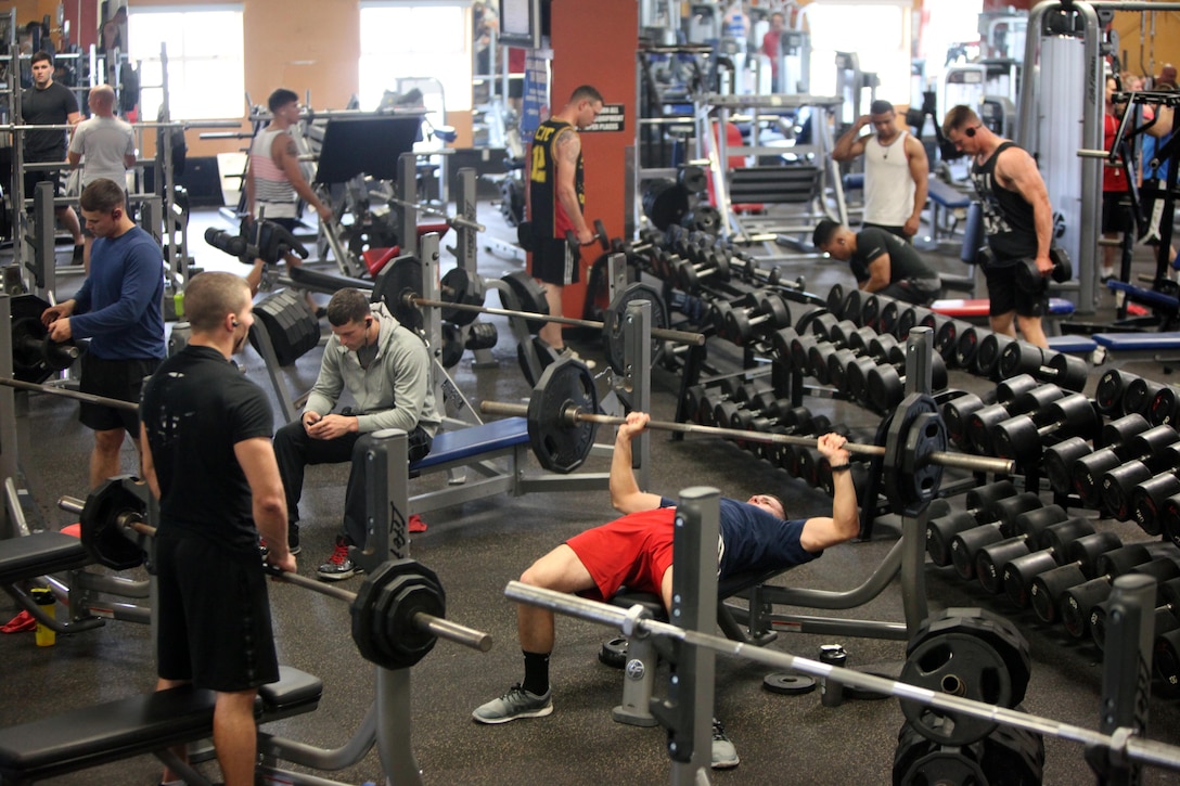 Marines work out in the Devil Dog gym at Marine Corps Air Station Cherry Point, Sept. 27, 2015.  The Hancock gym and Devil Dog gym’s hours will increase by more than 40 hours per week beginning Oct. 1, 2015, collectively between the two fitness facilities. The change in hours comes from the concerns of Marines on the air station being heard by their senior leadership. (U.S. Marine Corps photo by Lance Cpl. Jason Jimenez/Released)