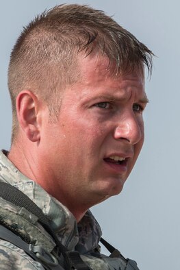 U.S. Air Force Tech. Sgt. Johnathan Maupin, 307th Security Forces Squadron, catches his breath after his team pushed a HUMVEE as part of the Warrior Run Challenge on Sept. 25, 2015, Camp Guernsey Joint Training Center, Wyo. The challenge consists of a team run, a HUMVEE push and a buddy carry through the finish line. (U.S. Air Force photo by Master Sgt. Greg Steele/Released)